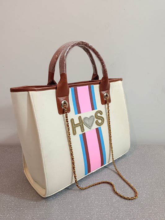 Off-white bag with embellished name