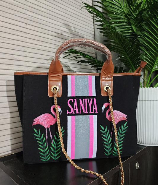 Black bag with flamingos