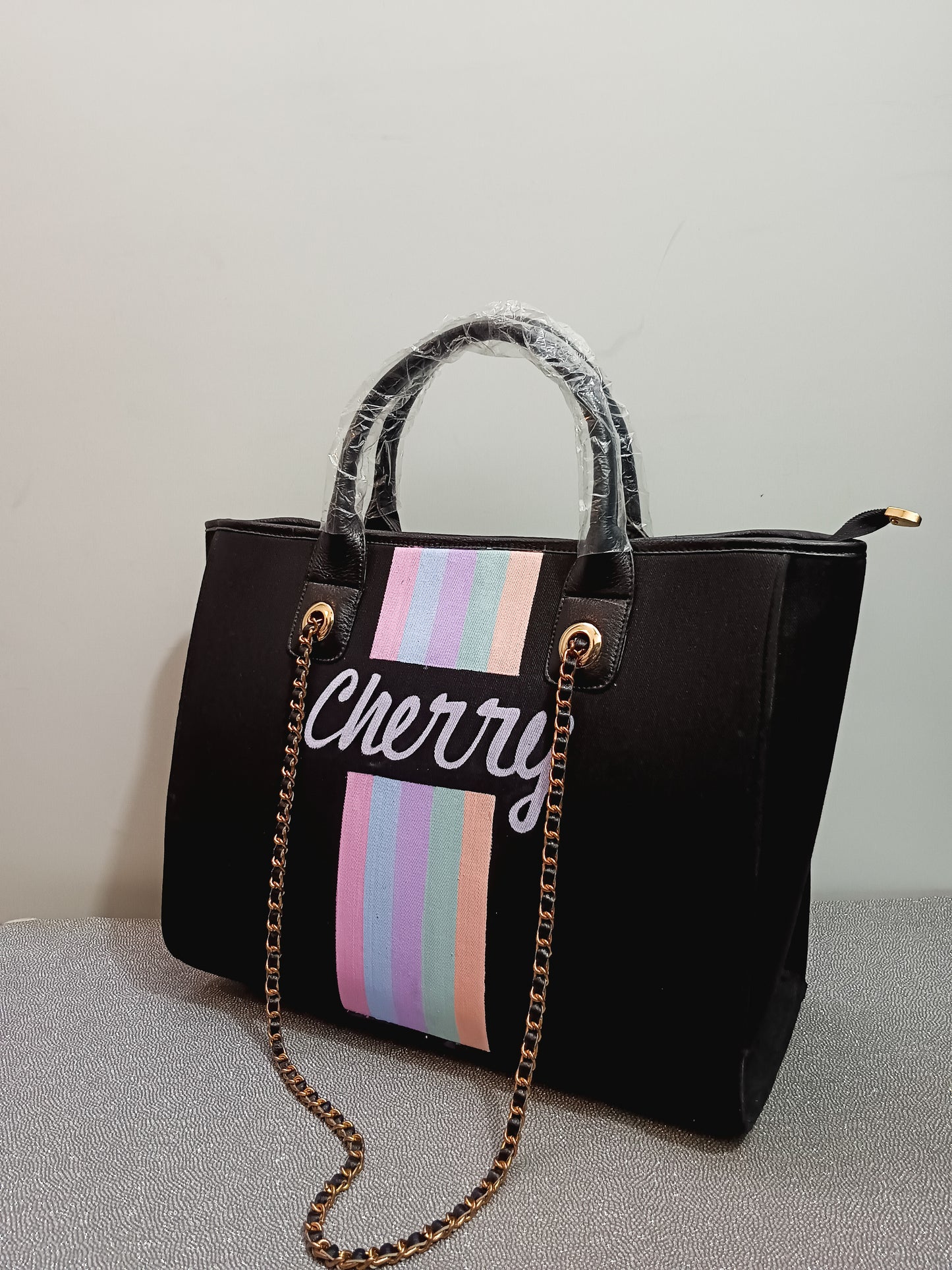 Black Bag with Pastel Stripes