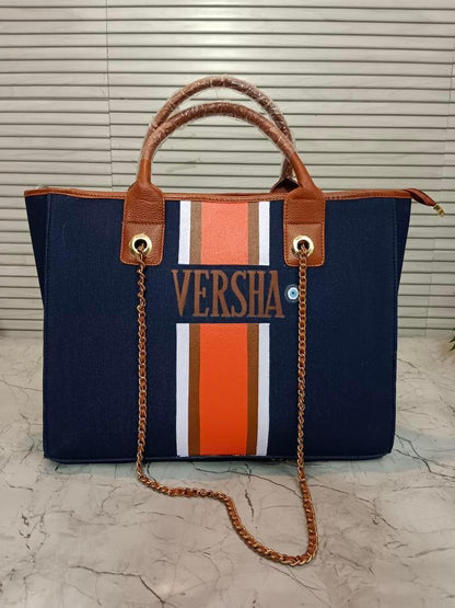 Navy blue tote with white, brown and orange stripes