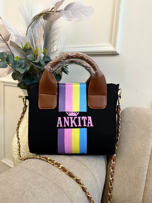 Black mini bag with multi-colour stripes