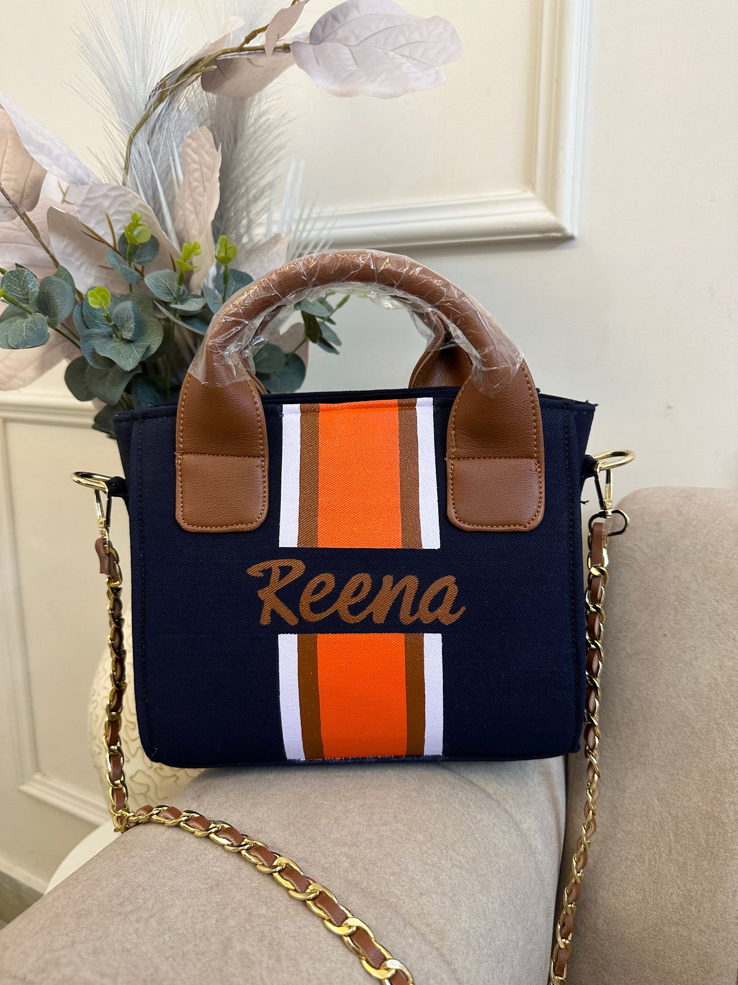 Navy blue mini with white, brown and orange stripes