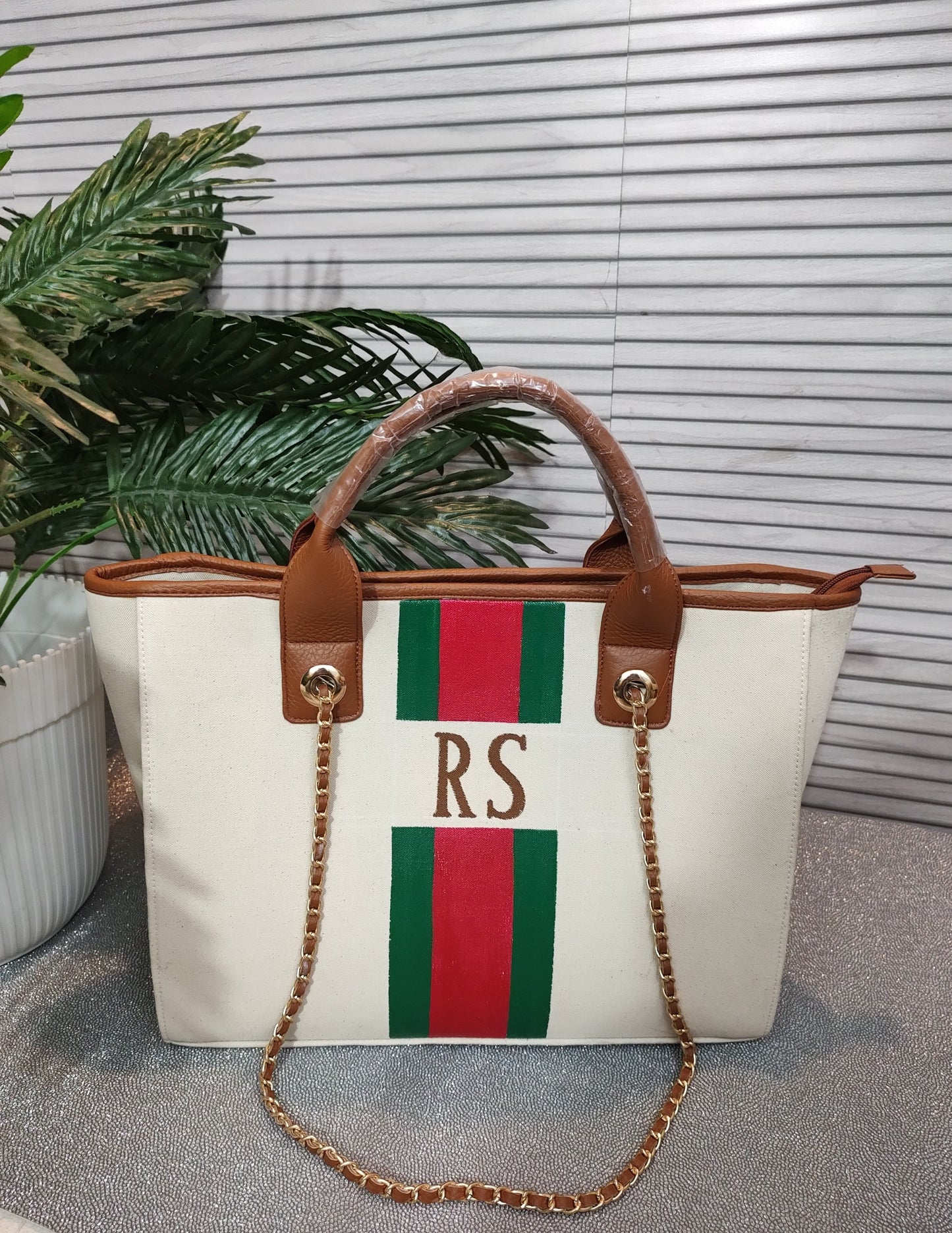 Off-white bag with green and red stripes