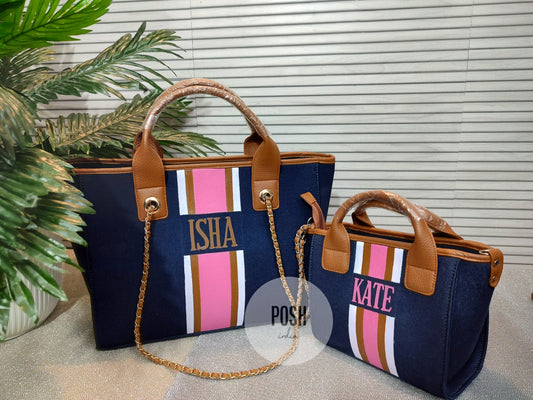 Navy blue mini bag with white, brown and pink stripes