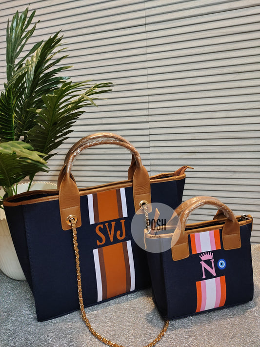 Navy blue mini tote with orange, baby pink and white stripes