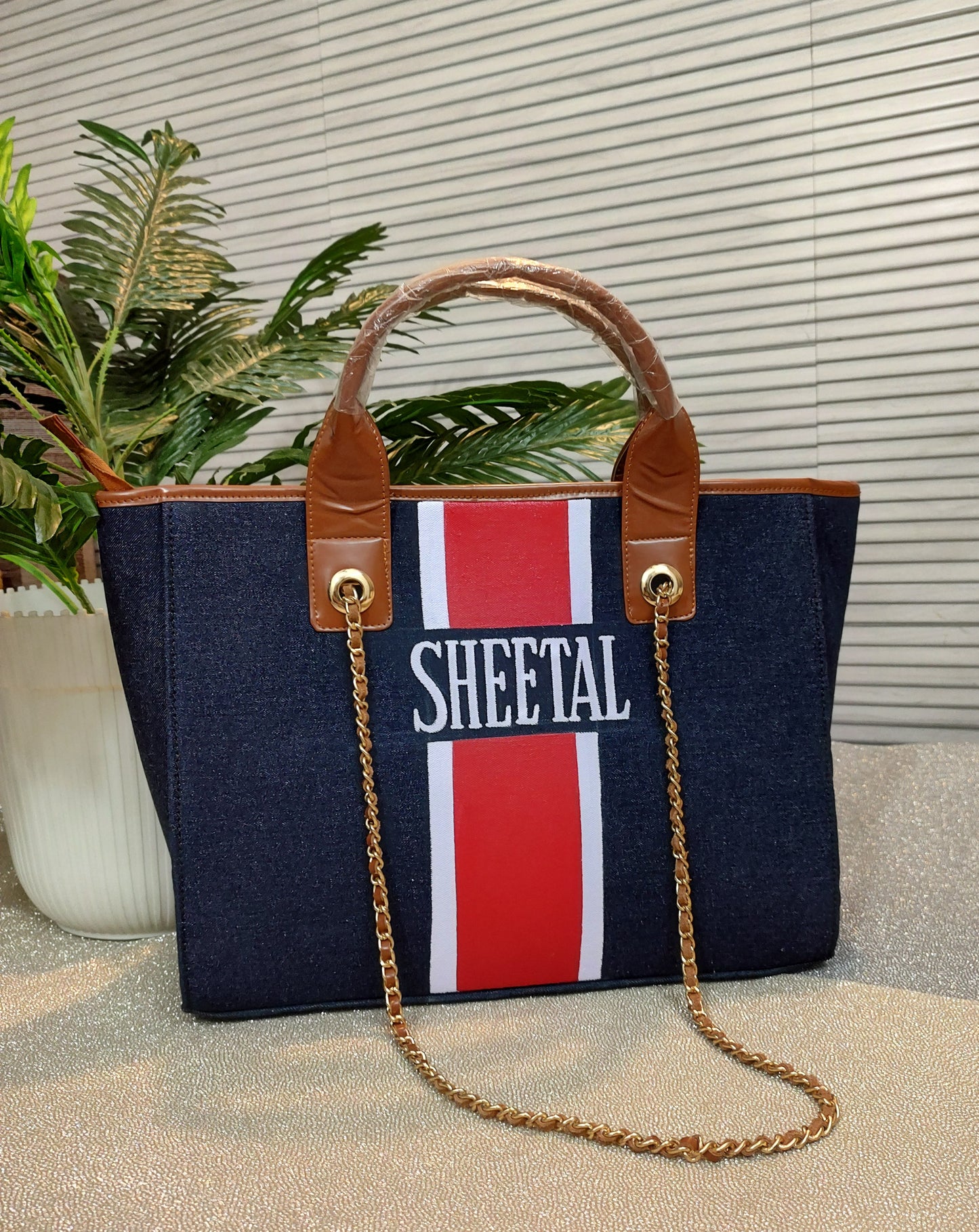 Navy blue tote with white and red stripes