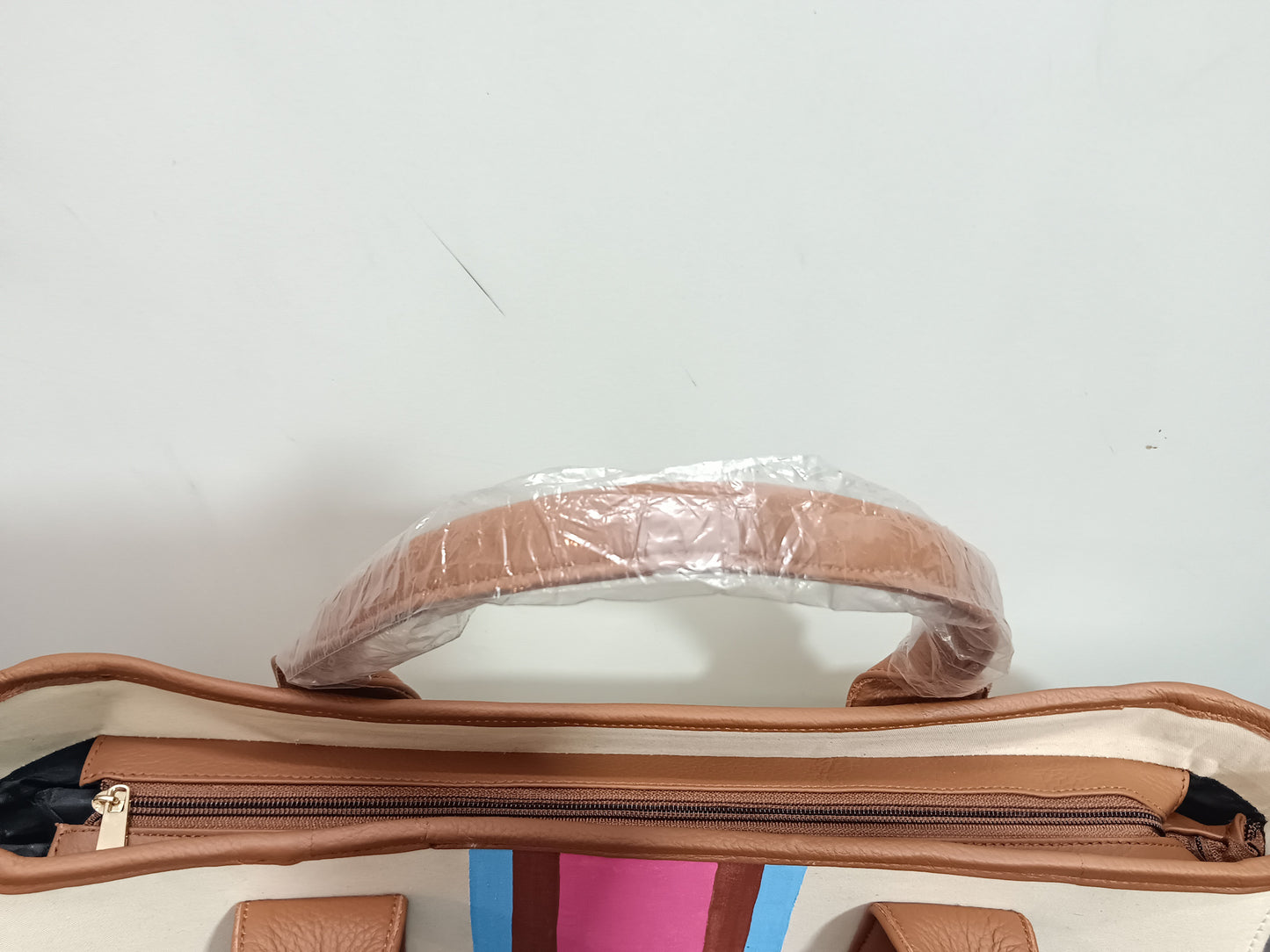 Off-white bag with Brown, Blue and Pink Stripes